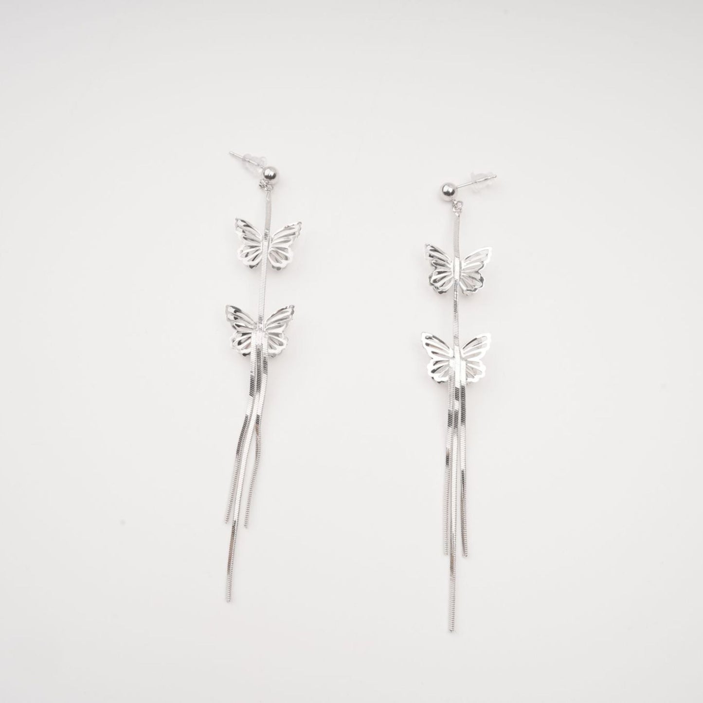 Bella silver butterfly drop earrings